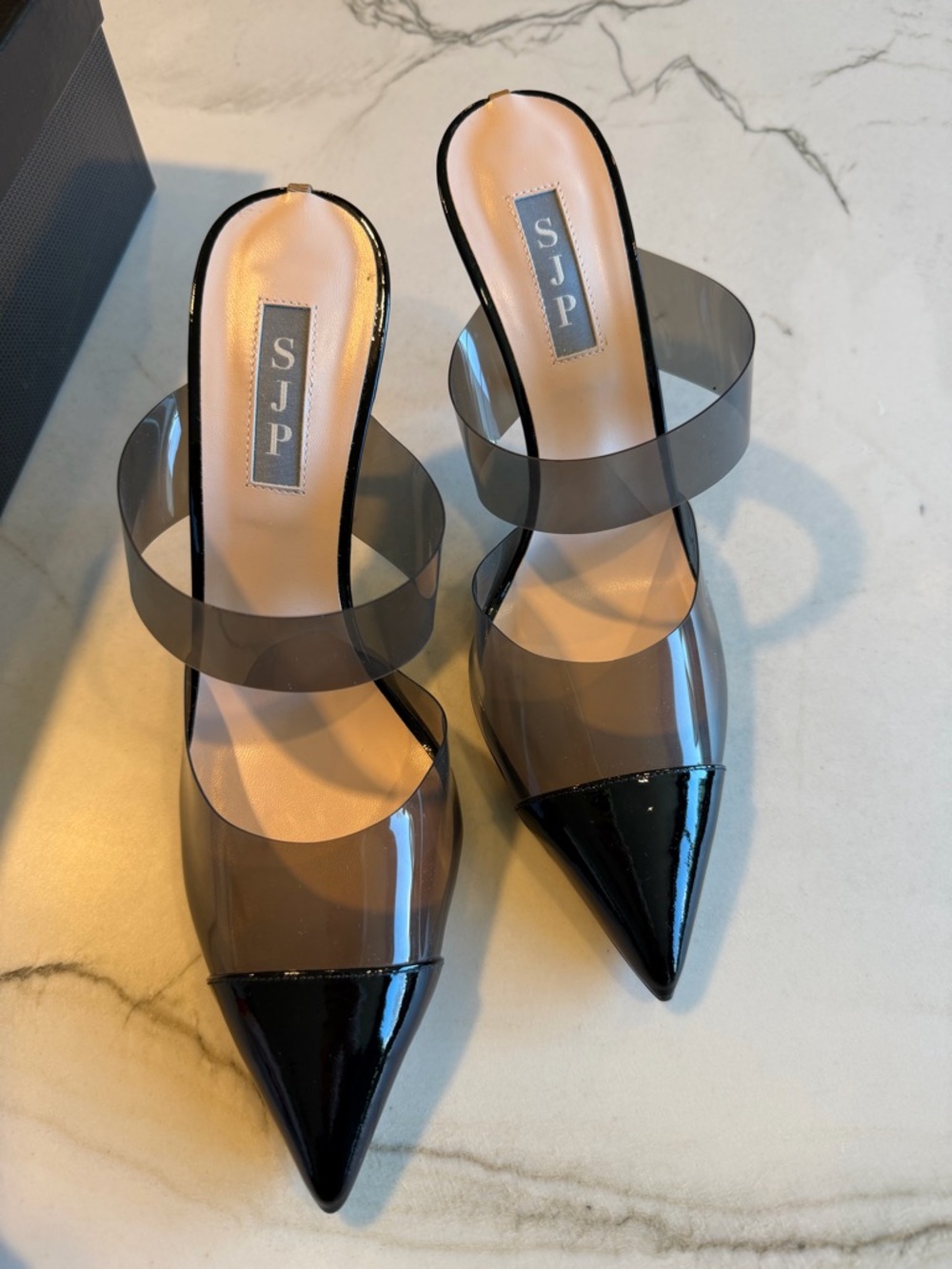 SJP Exude Women's Black Pointed Clear Strap Mules